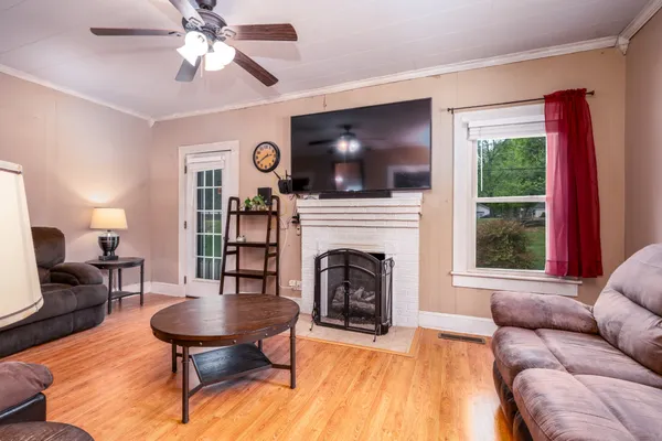 a living room with furniture and a window