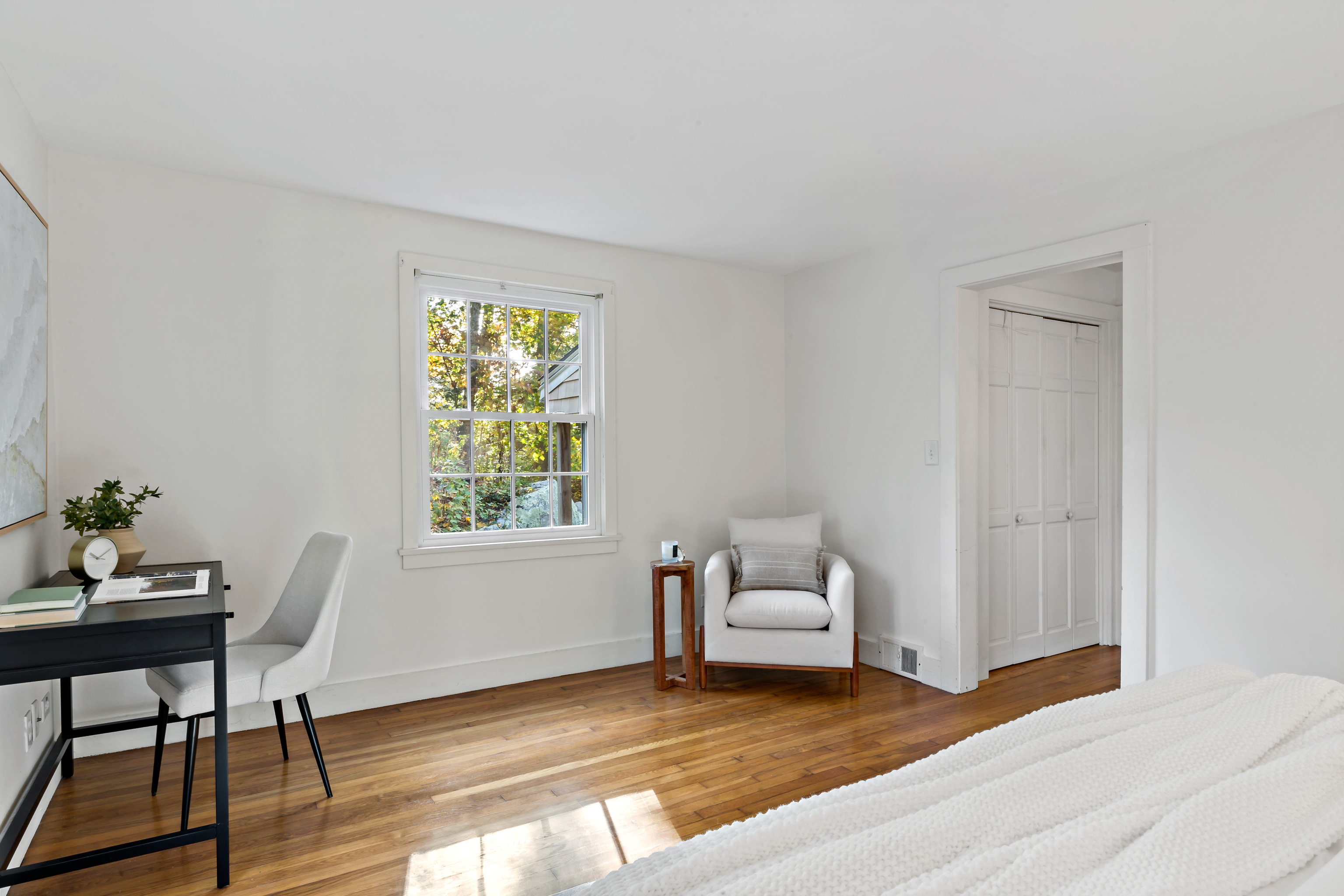 12 Flanders Road Stonington, CT 06378 - Photo 15 of 36 a living room with furniture and a window