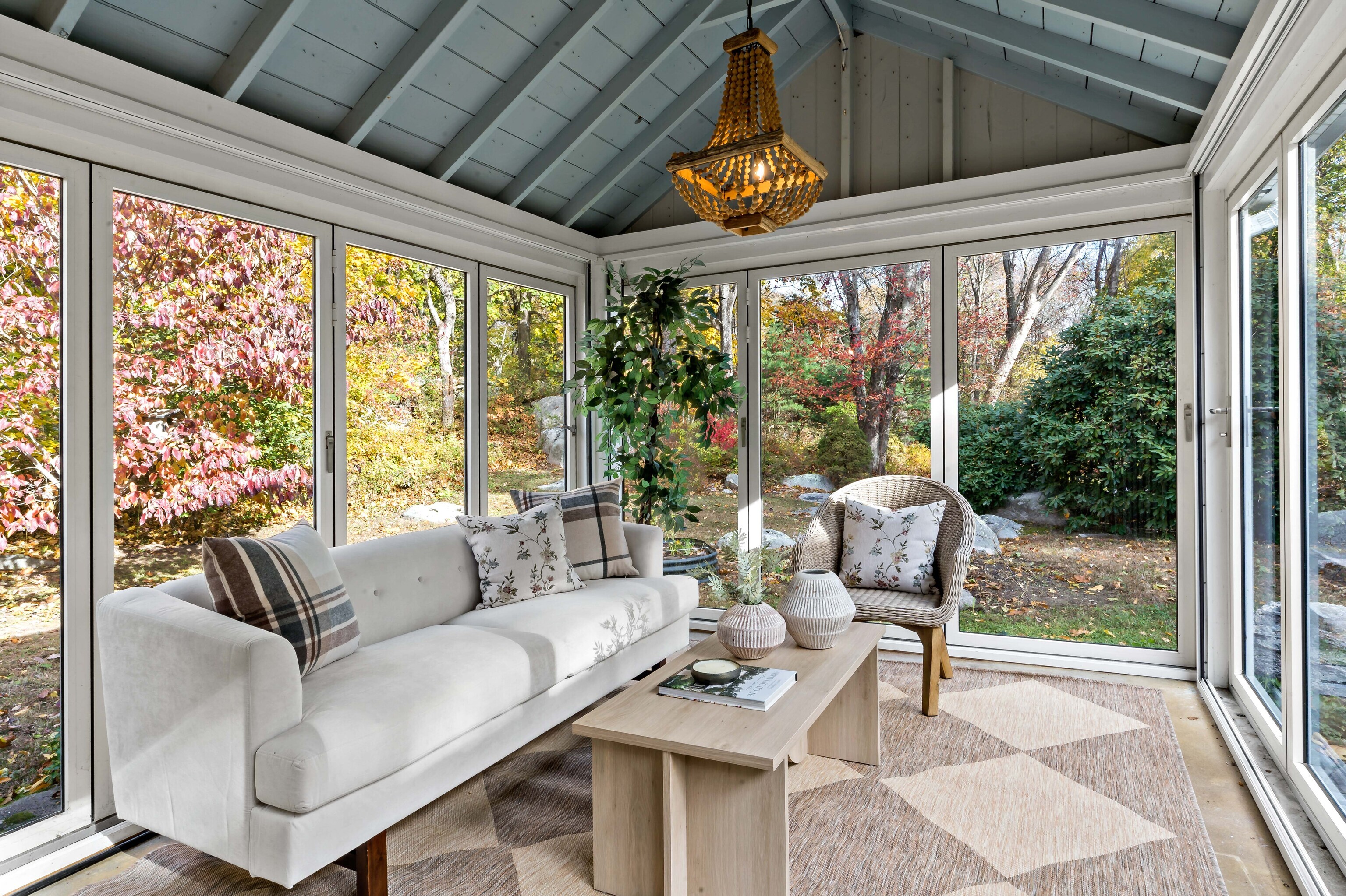 12 Flanders Road Stonington, CT 06378 - Photo 19 of 36 a living room with furniture and a large window