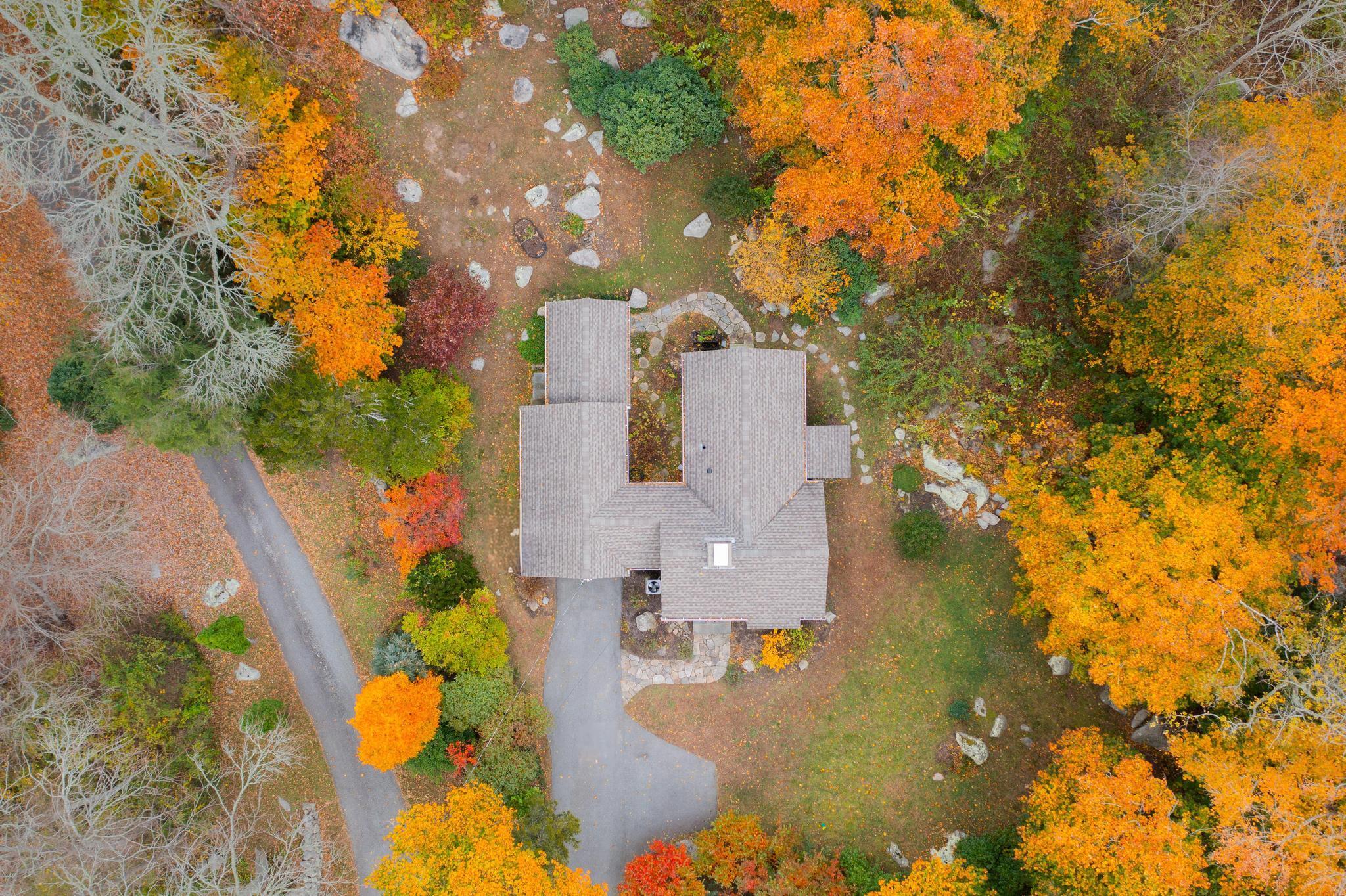 12 Flanders Road Stonington, CT 06378 - Photo 22 of 36 a view of a house with a yard