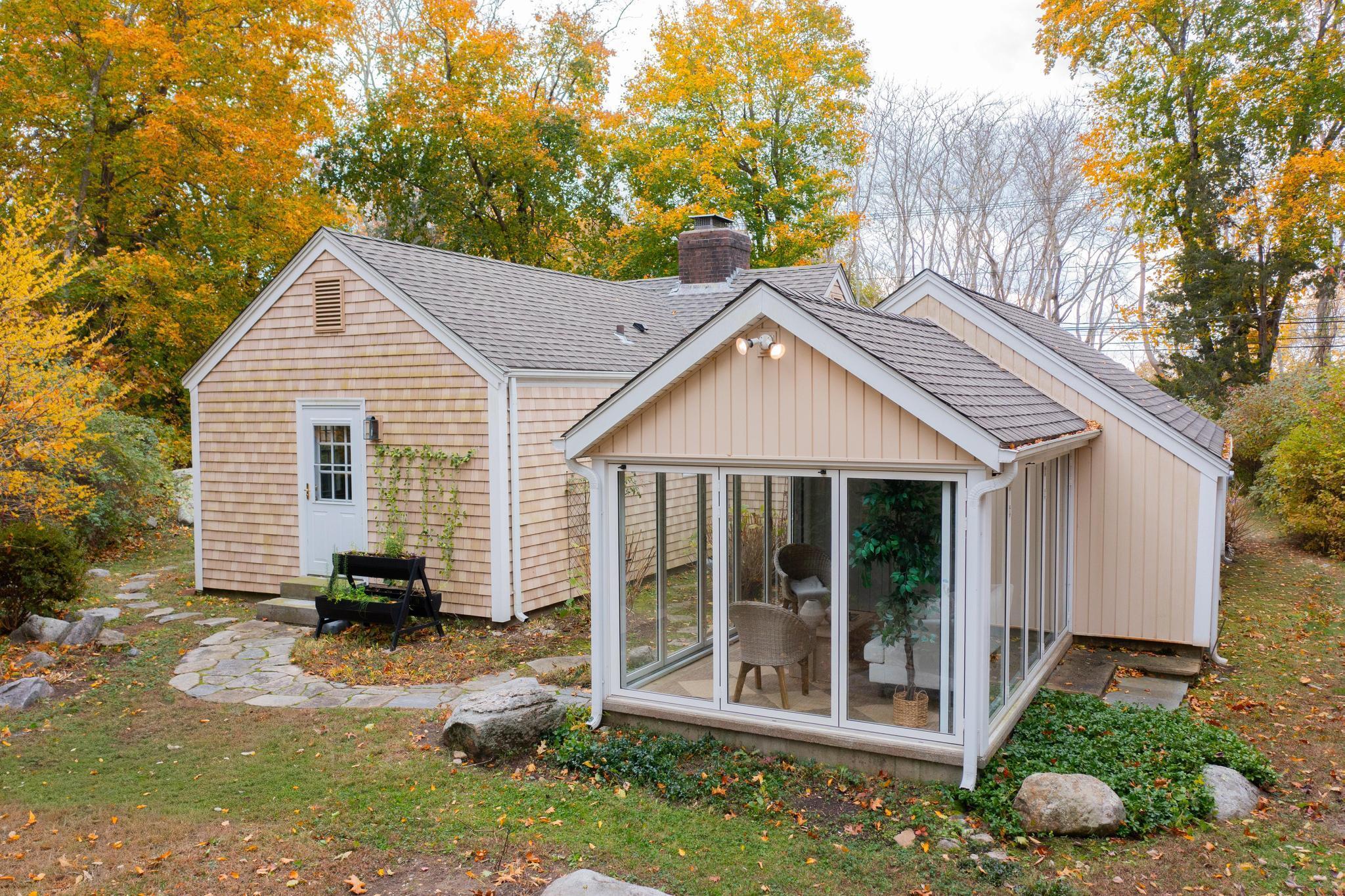 12 Flanders Road Stonington, CT 06378 - Photo 35 of 36 a view of a house with backyard