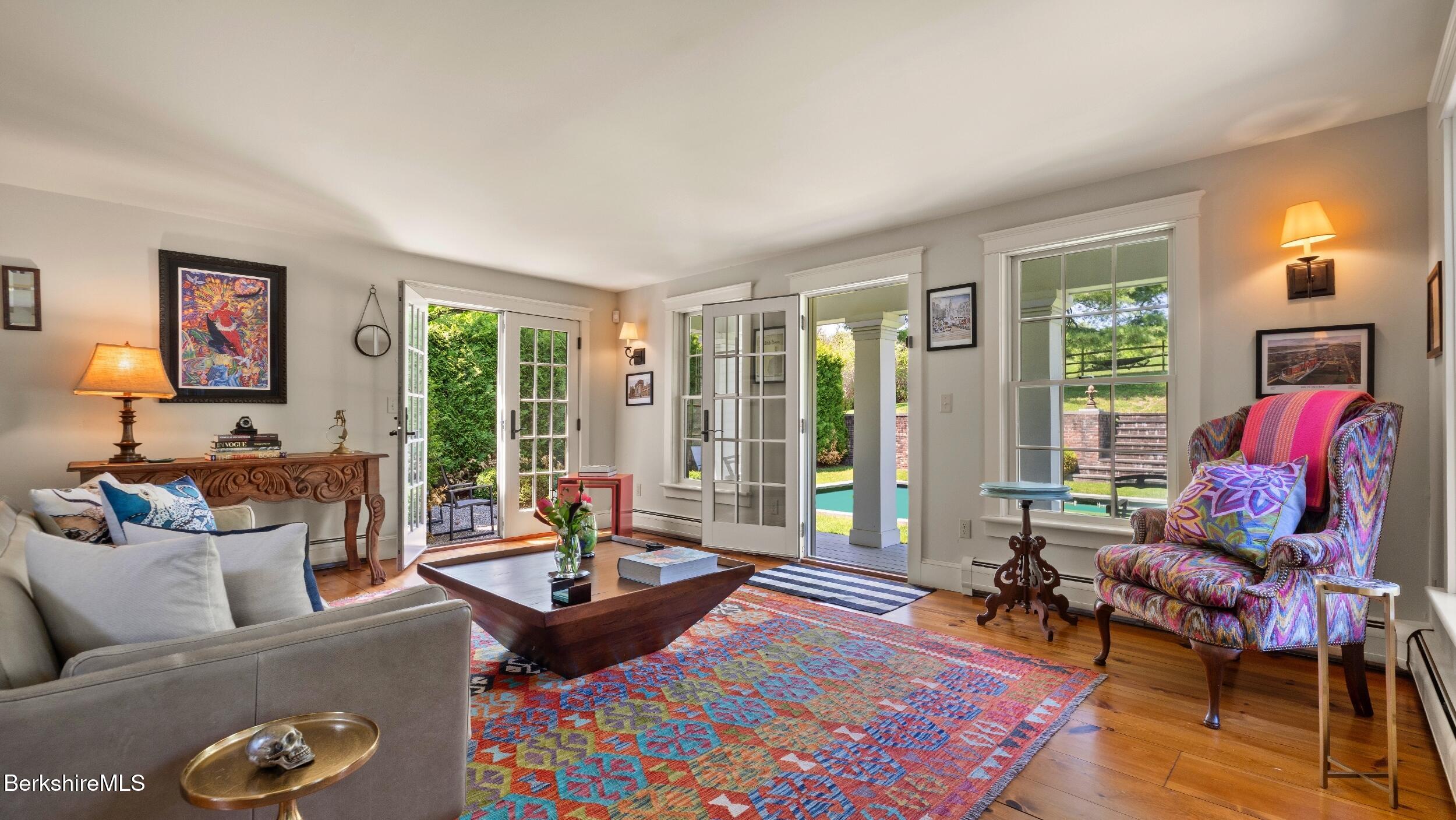 2650 Swamp Road Richmond, MA 01254 - Photo 37 of 49 a living room with furniture and a large window