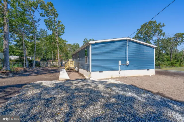 a house view with a backyard space