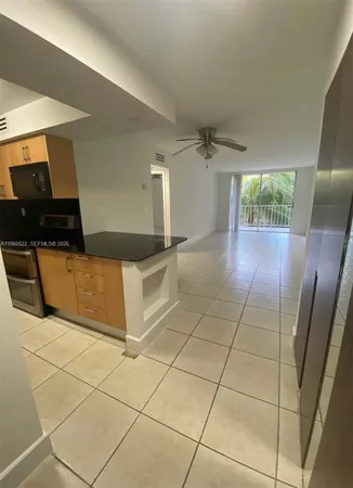 a view of a livingroom with furniture and window