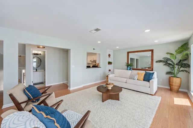 a kitchen with a sink and a stove