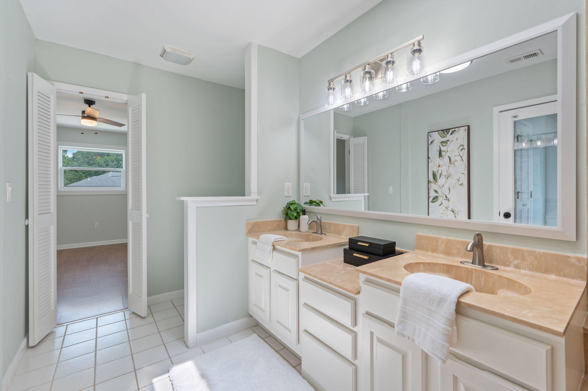 3 Bayshore Point Valparaiso, FL 32580 - Photo 31 of 70 a bathroom with a sink vanity and mirror