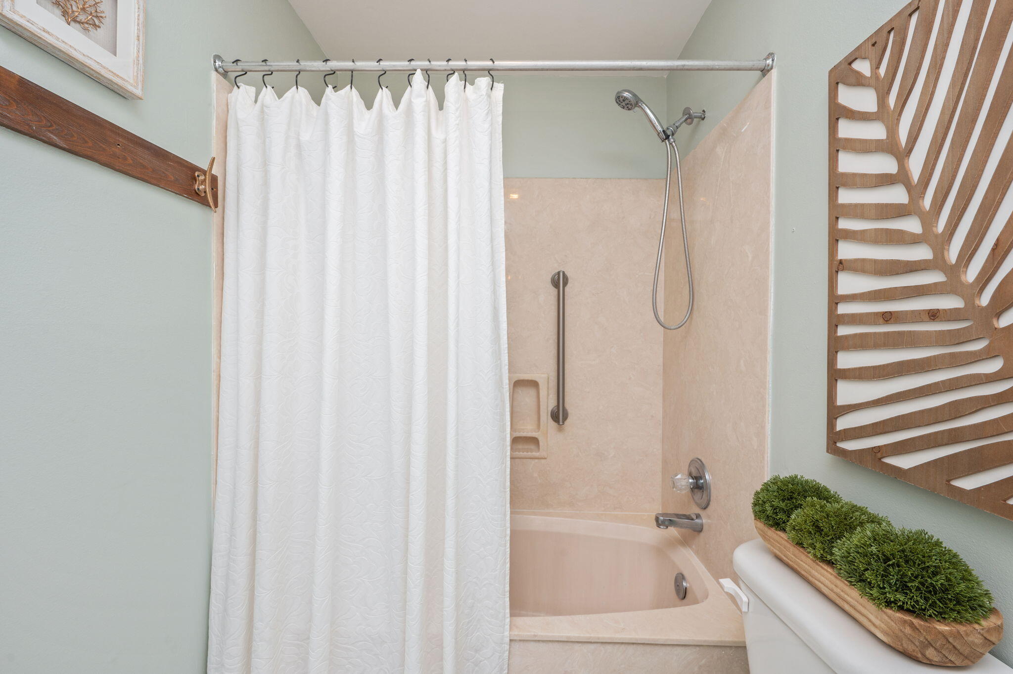 3 Bayshore Point Valparaiso, FL 32580 - Photo 34 of 70 a bathroom with a shower curtain and a window