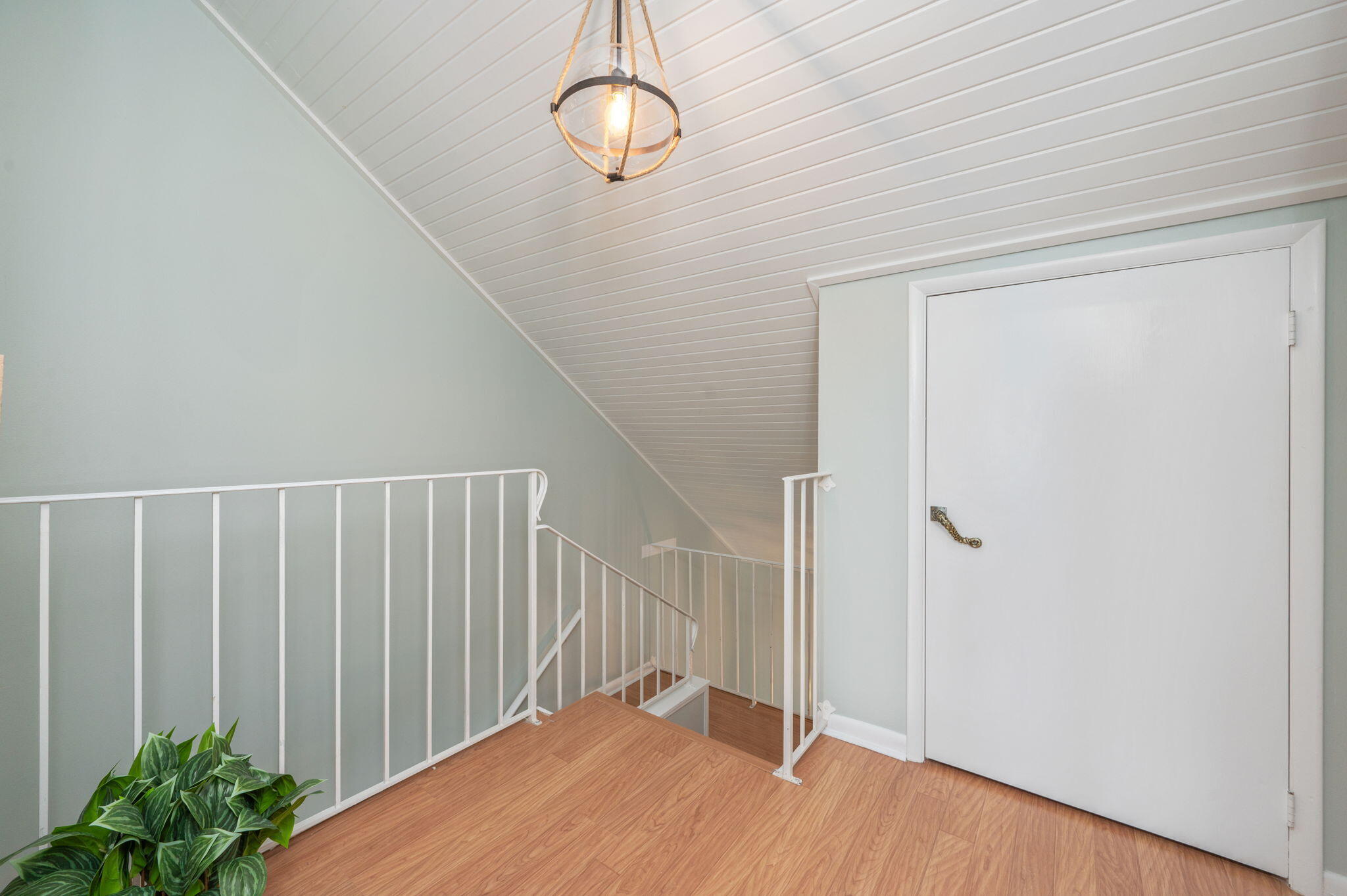 3 Bayshore Point Valparaiso, FL 32580 - Photo 38 of 70 a view of a hallway with wooden floor and staircase