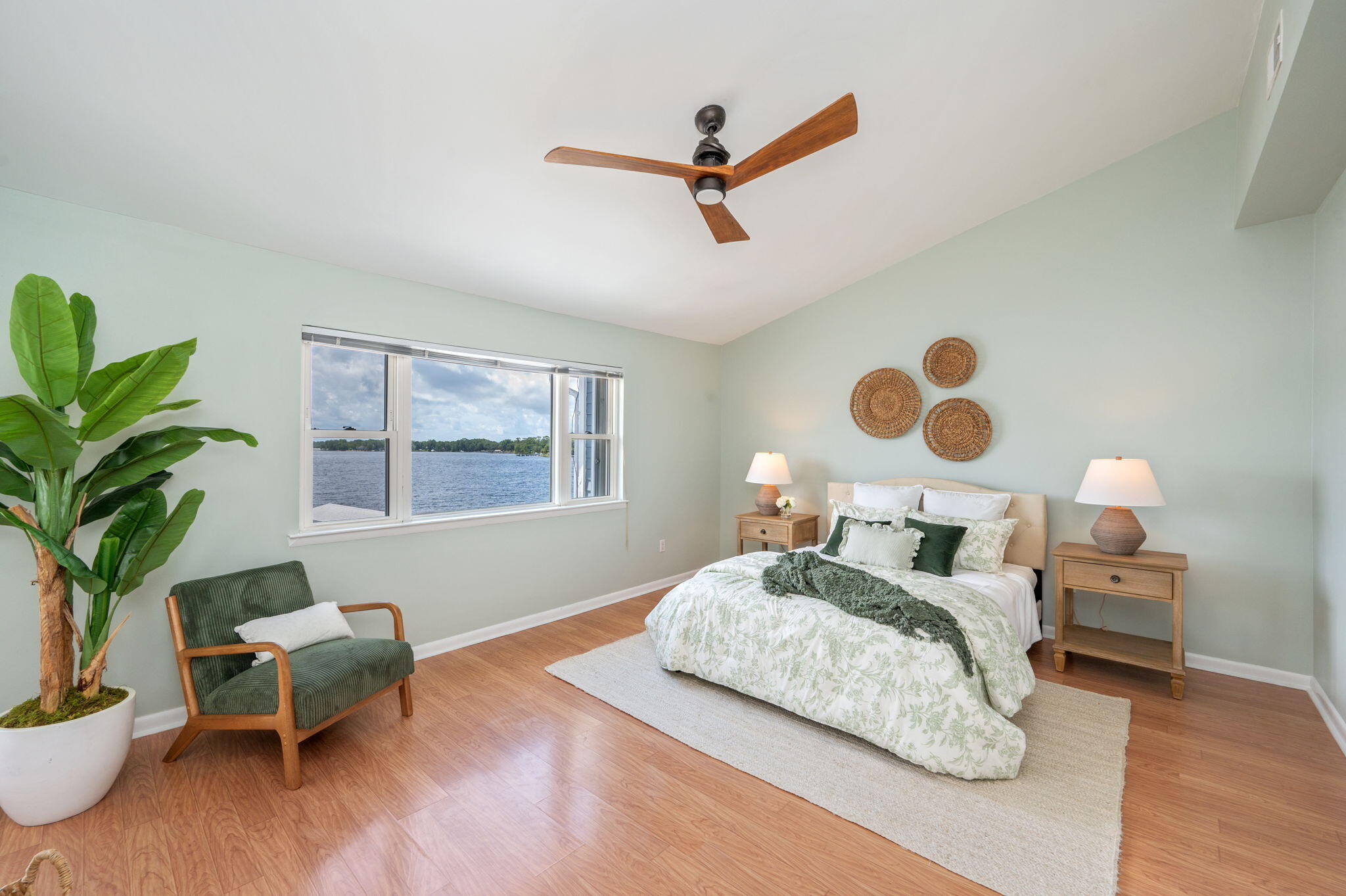 3 Bayshore Point Valparaiso, FL 32580 - Photo 5 of 70 a bedroom with a bed and wooden floor