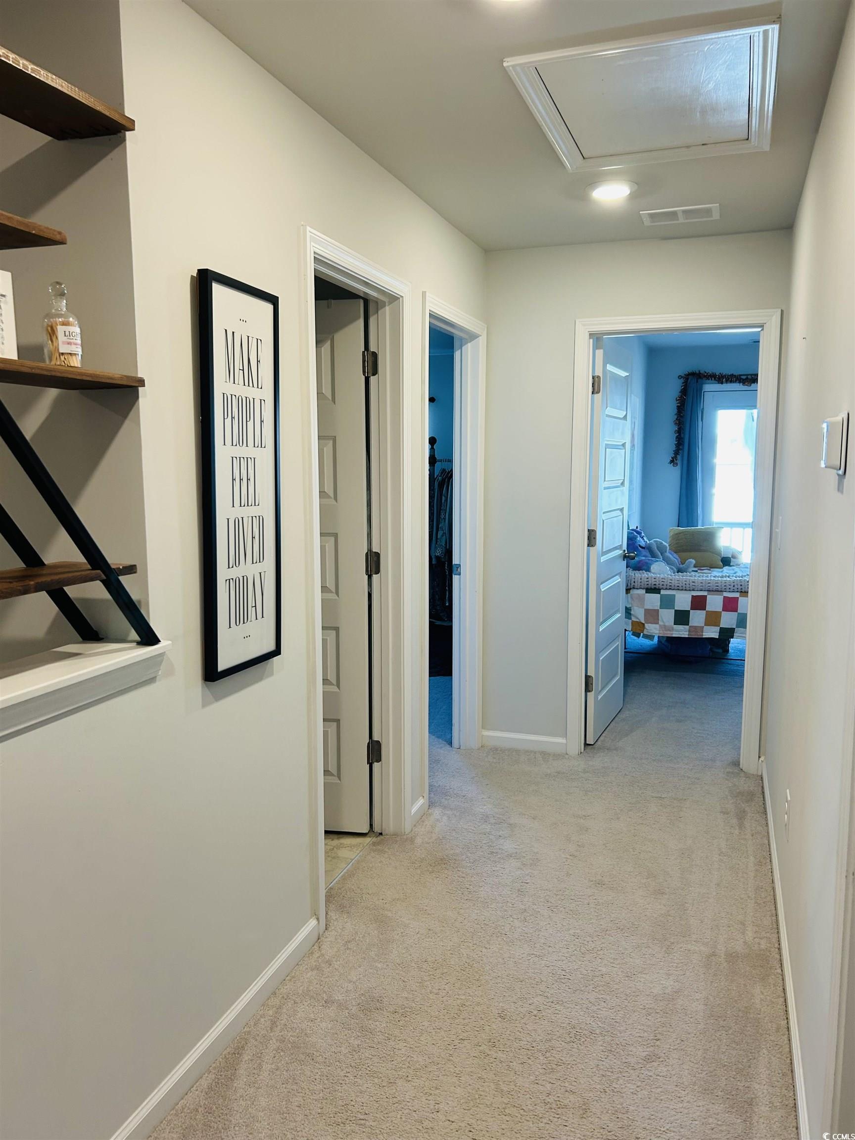 609 Shortleaf Path Myrtle Beach, SC 29577 - Photo 20 of 40 Hallway with light colored carpet