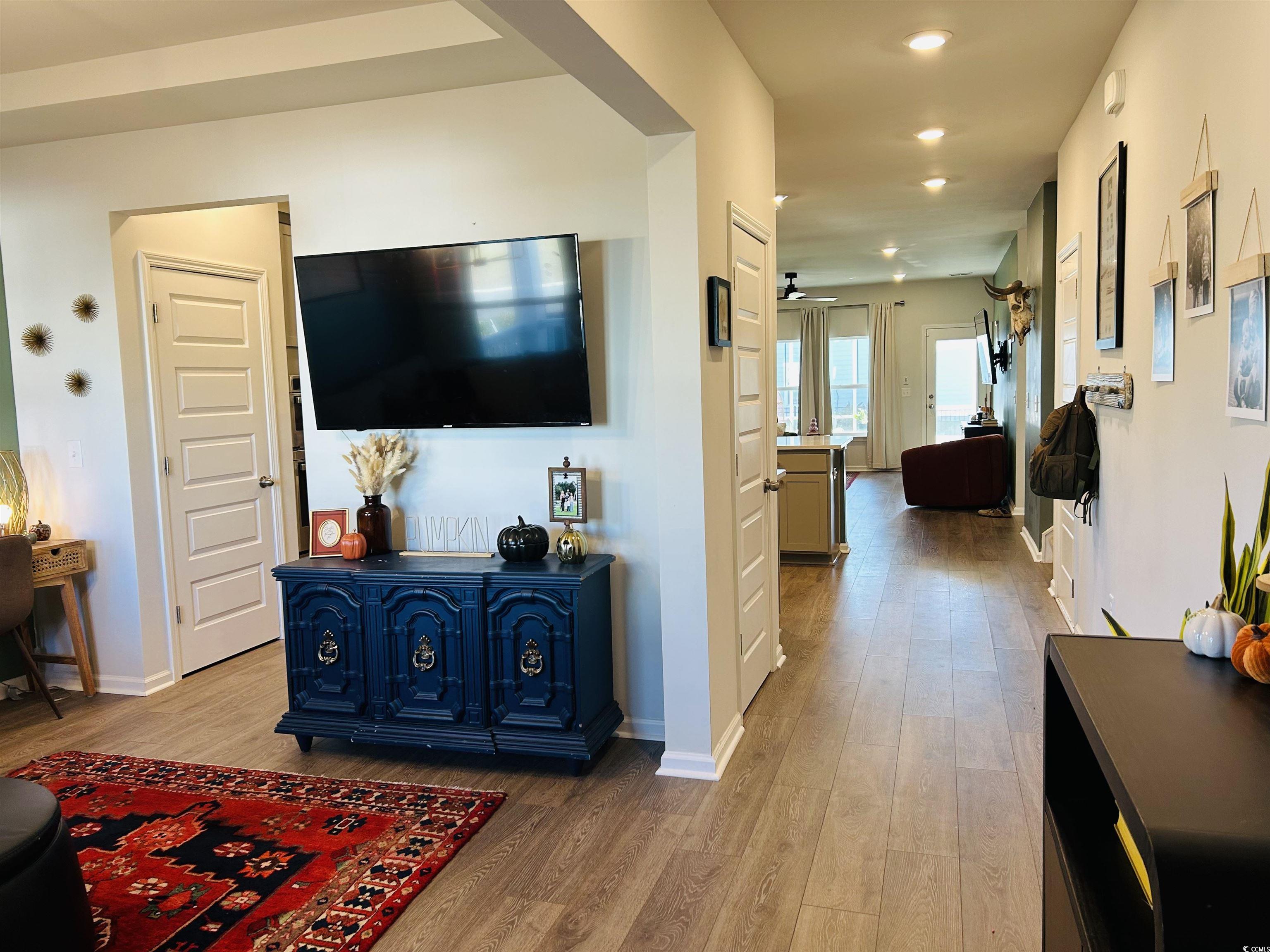609 Shortleaf Path Myrtle Beach, SC 29577 - Photo 25 of 40 Living area with light wood-style flooring and recessed lighting