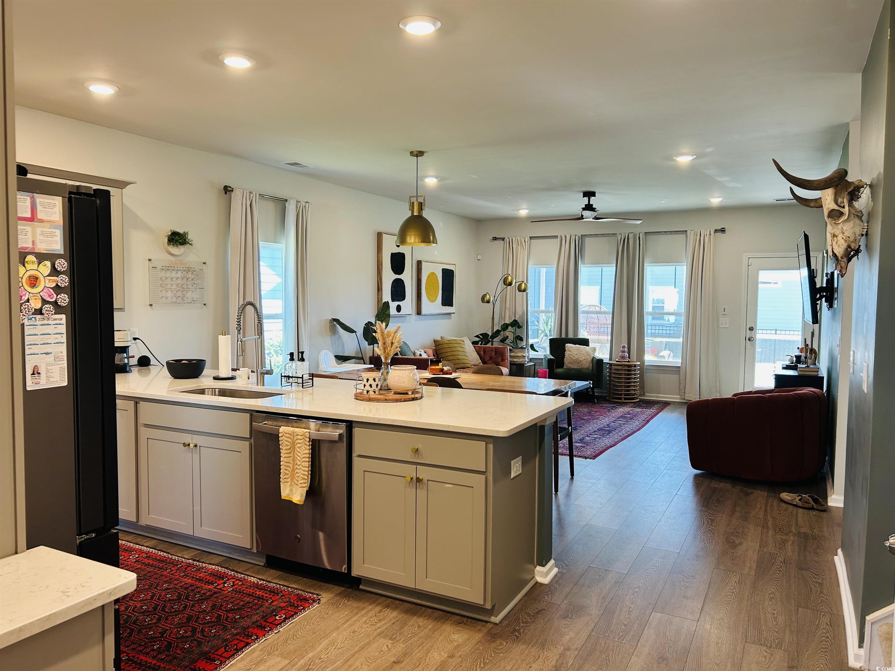 609 Shortleaf Path Myrtle Beach, SC 29577 - Photo 39 of 40 Kitchen with open floor plan, dishwasher, decorative light fixtures, healthy amount of natural light, and recessed lighting