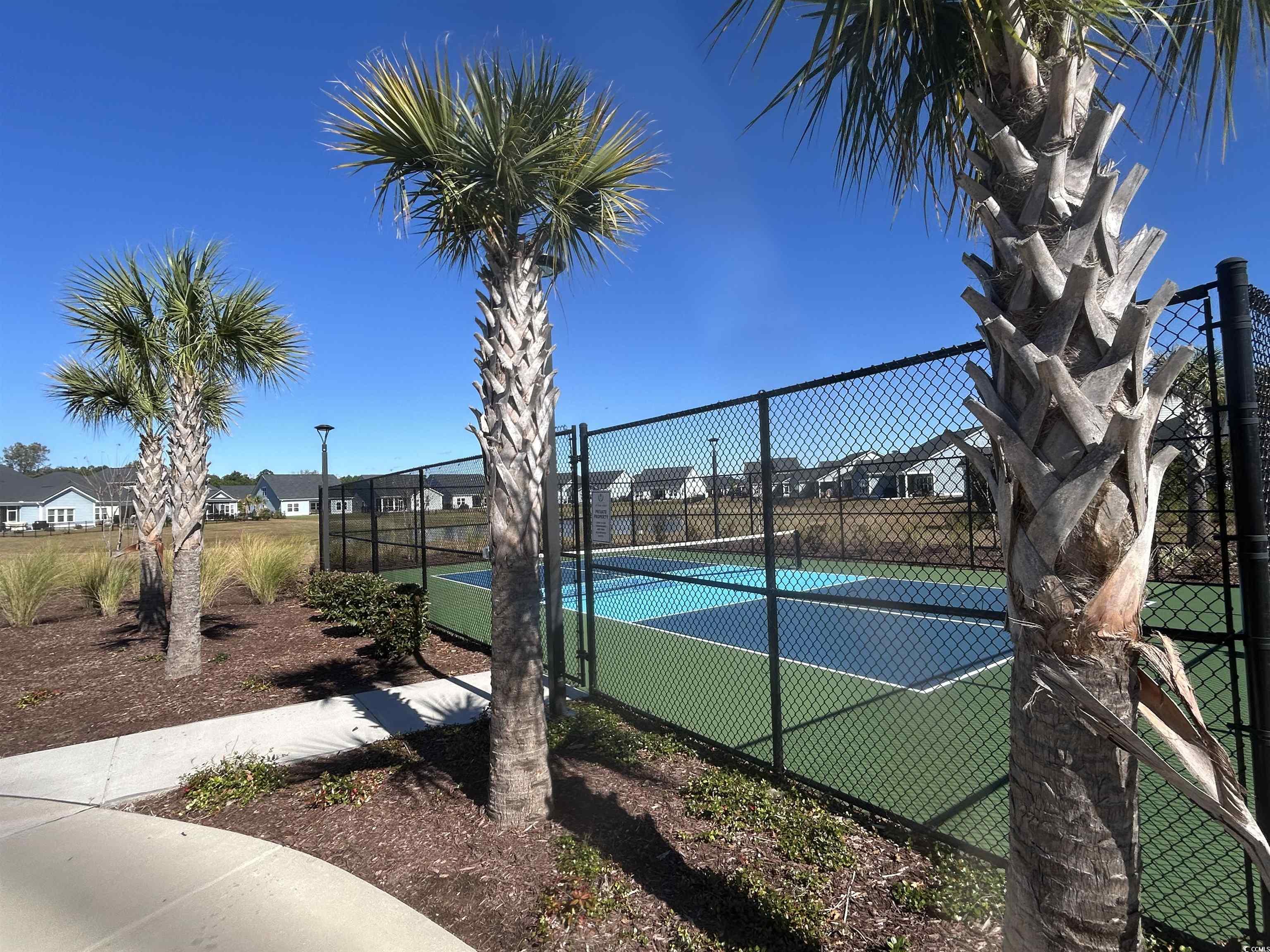 609 Shortleaf Path Myrtle Beach, SC 29577 - Photo 34 of 40 View of the pickle ball court featuring a residential view