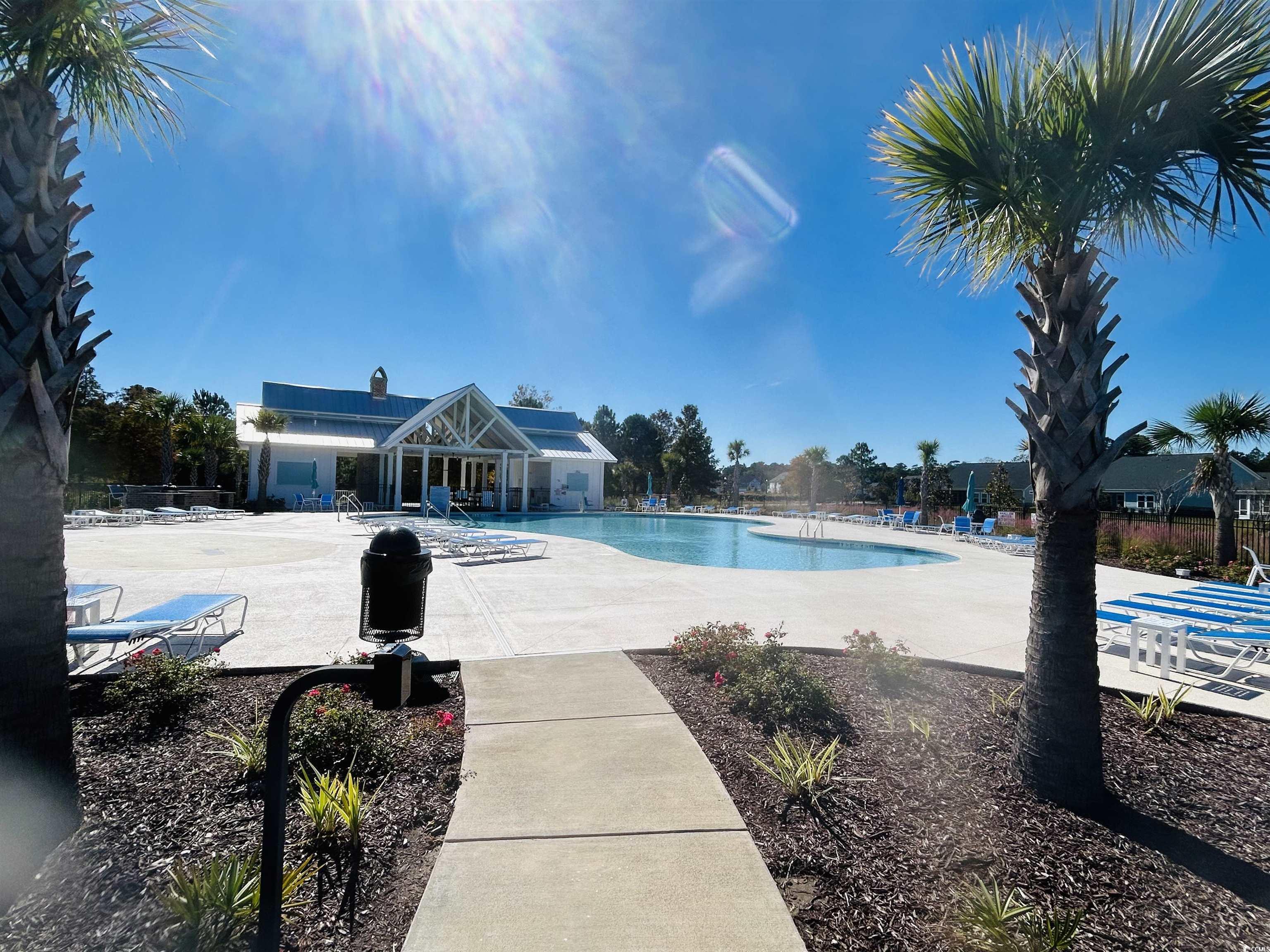 609 Shortleaf Path Myrtle Beach, SC 29577 - Photo 37 of 40 Community pool with a patio