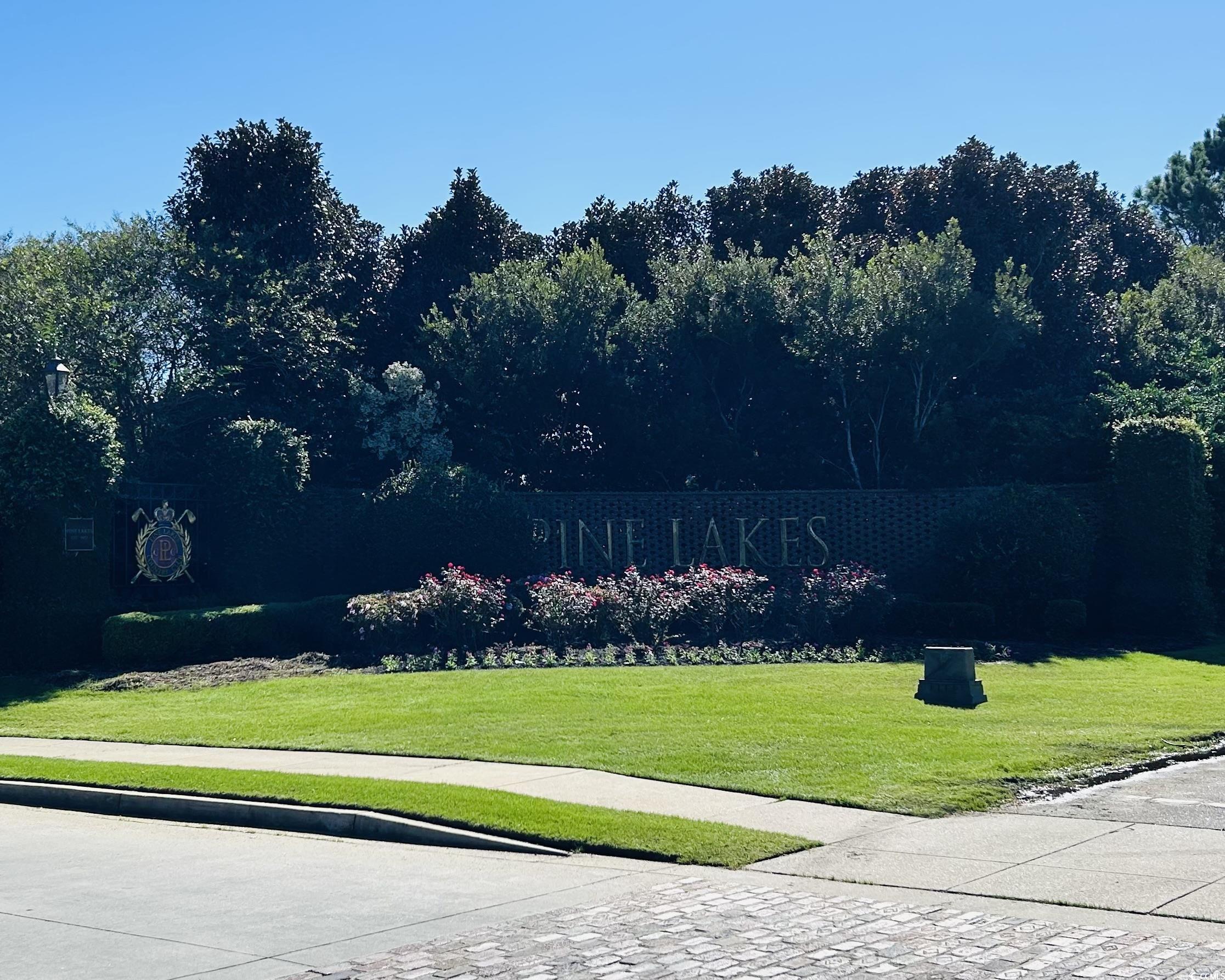 609 Shortleaf Path Myrtle Beach, SC 29577 - Photo 38 of 40 View of property's community featuring a lawn