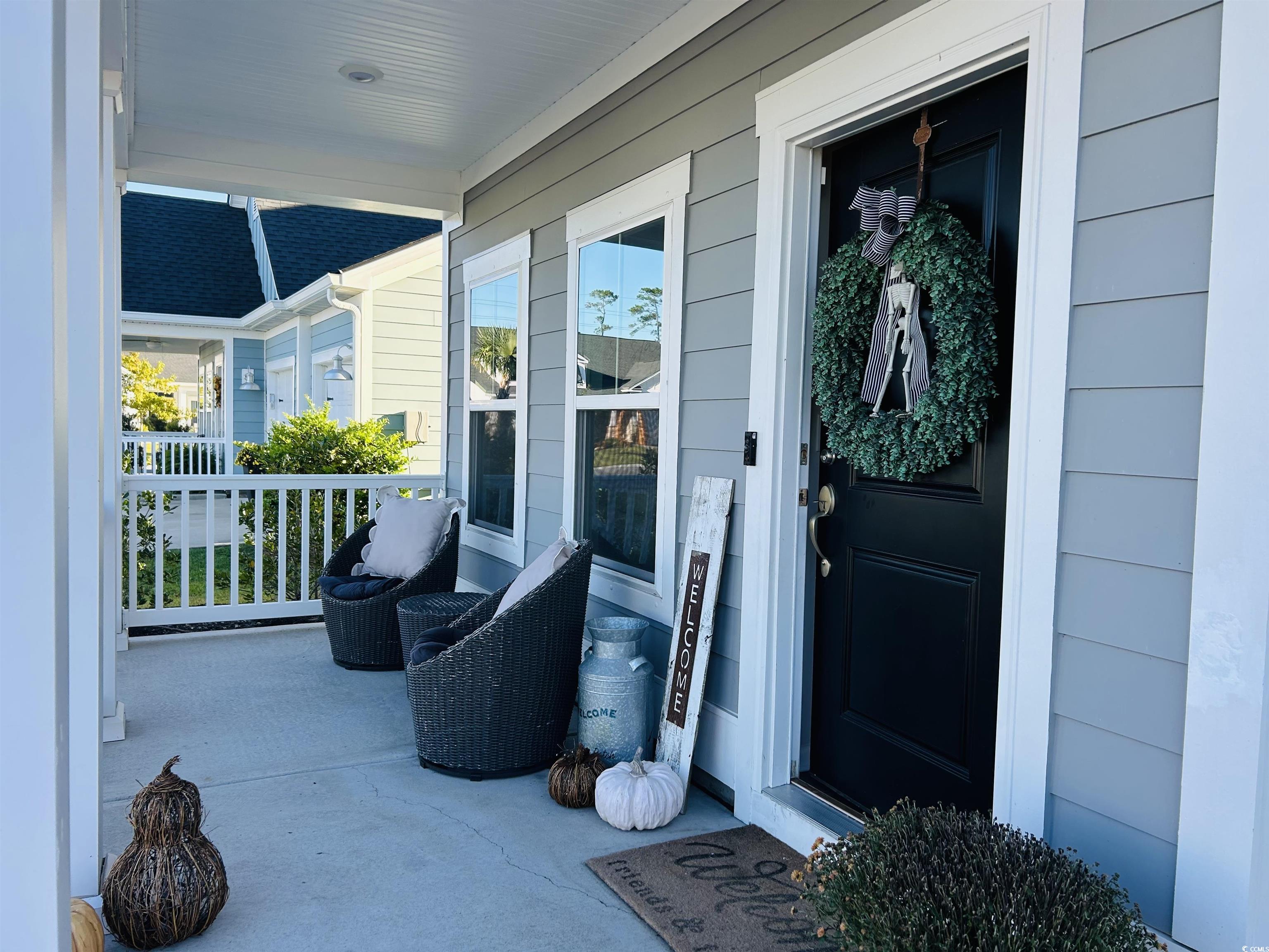 609 Shortleaf Path Myrtle Beach, SC 29577 - Photo 4 of 40 Doorway to property with covered porch