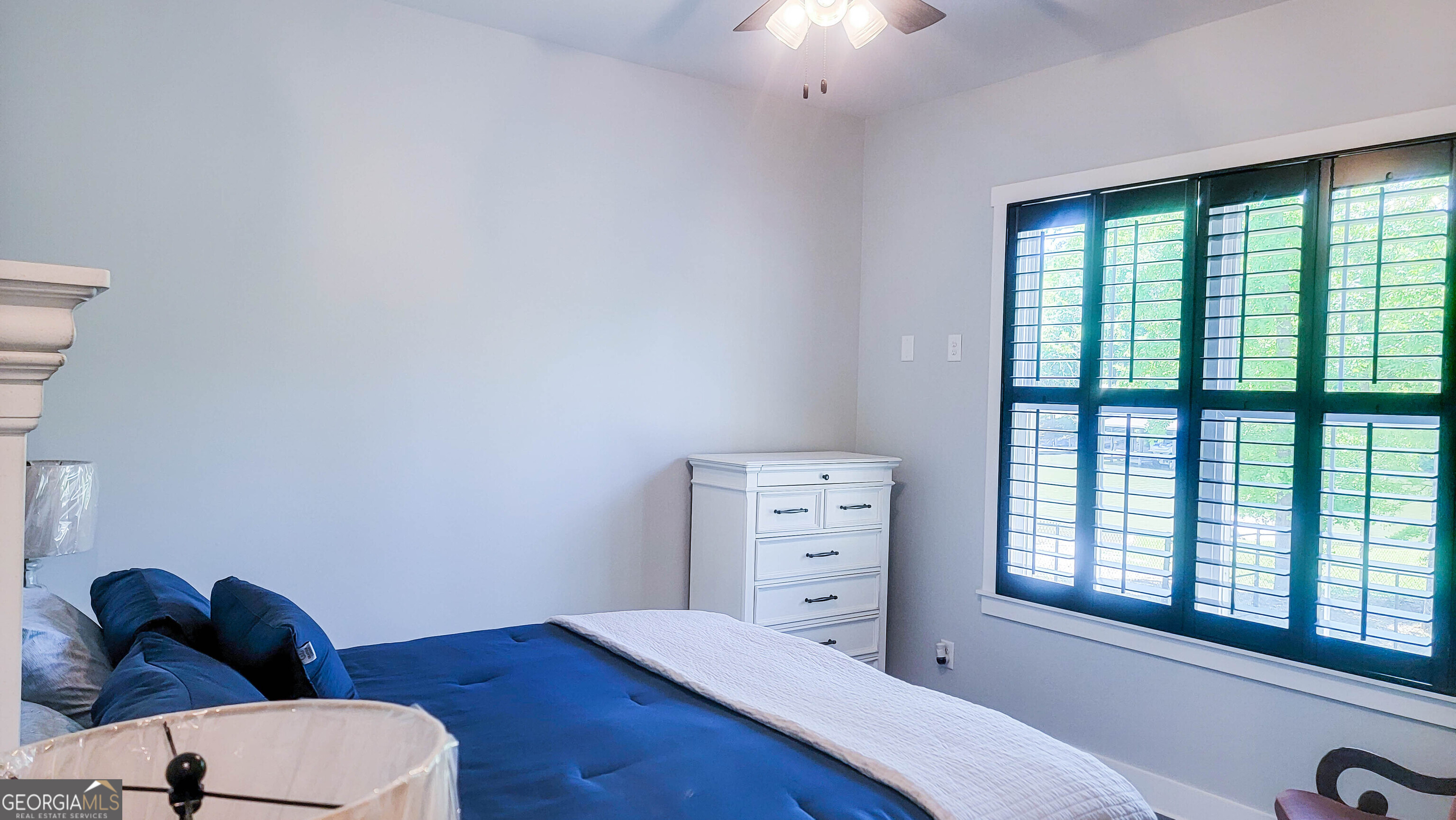 209 Lee Road Salem, AL 36874 - Photo 31 of 37 a bedroom with a bed and a window