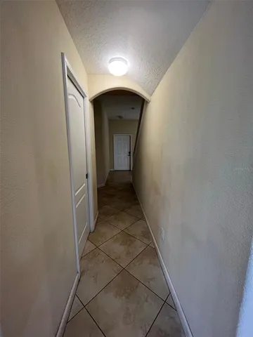 a view of a big room with carpet