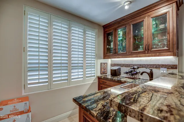 a kitchen with a stove and a sink