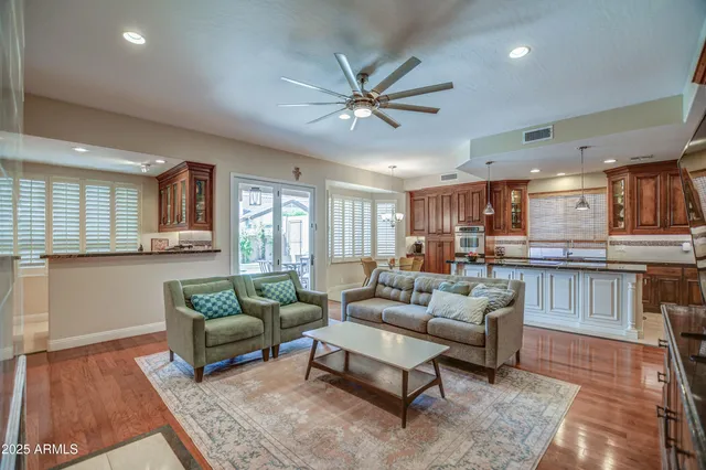 a spacious bedroom with a bed and a couch