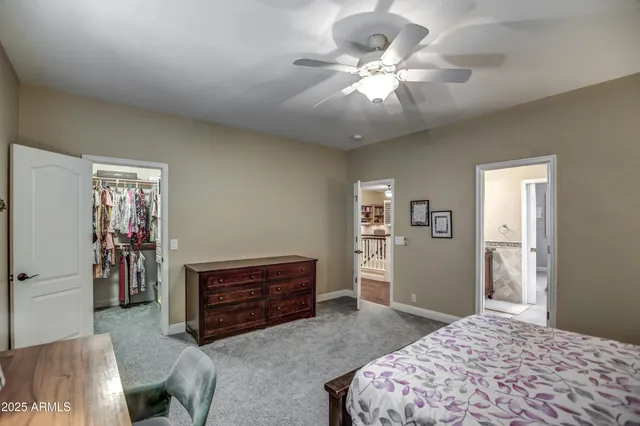 an aerial view of a house with garden space and street view