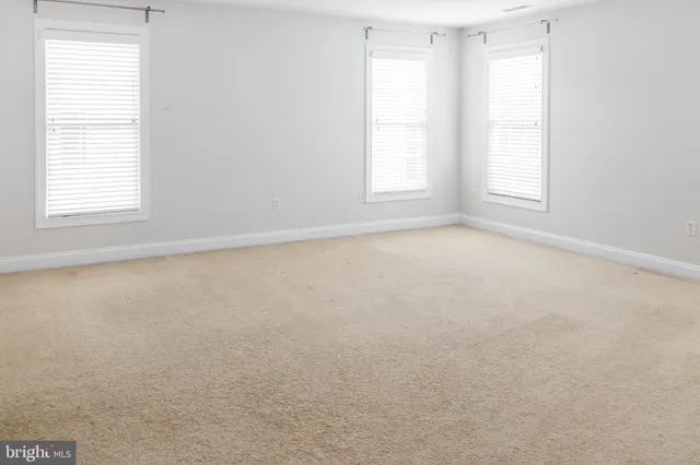 a bathroom with a sink and a window