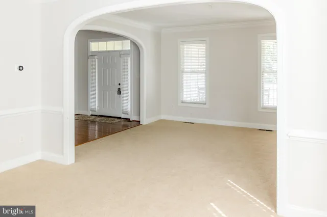 an empty room with windows