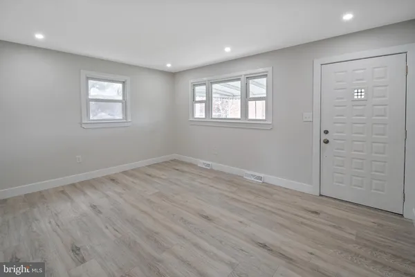 a kitchen with a stove microwave and refrigerator