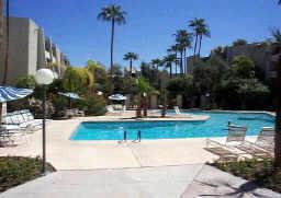 7625 East Camelback Road, Unit B250 Scottsdale, AZ 85251 - Photo 1 of 1 a view of a fountain in front of a house