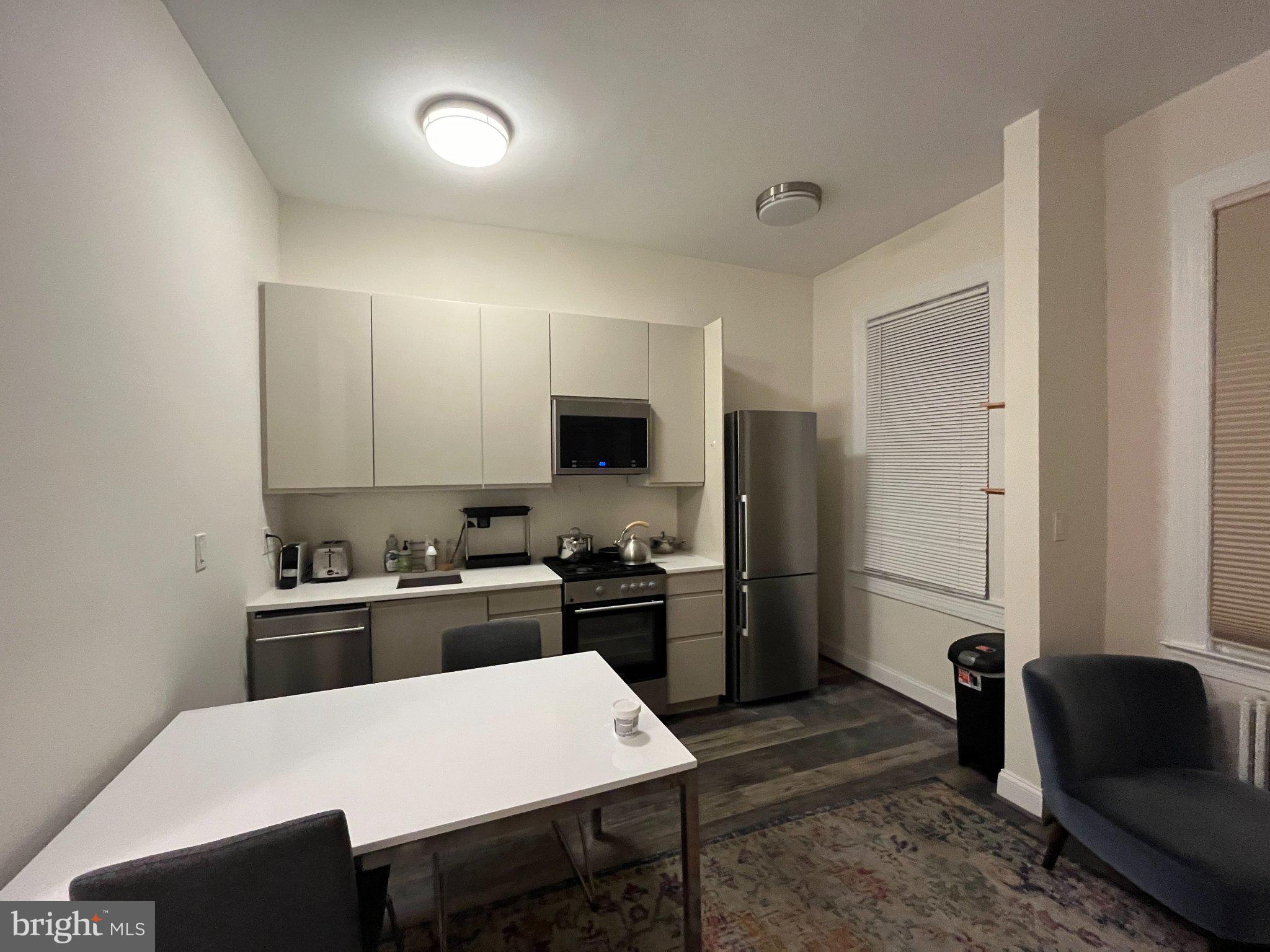 3003 P Street Northwest Washington, DC 20007 - Photo 2 of 7 Modern kitchen with sleek design.