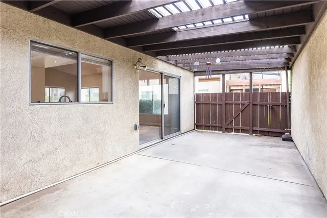 a view of an empty room with a balcony