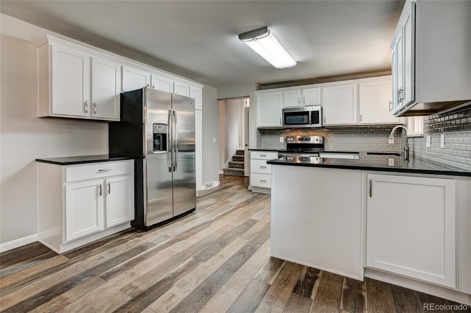 3633 Simms Street Wheat Ridge, CO 80033 - Photo 9 of 35 Gallery Image 9