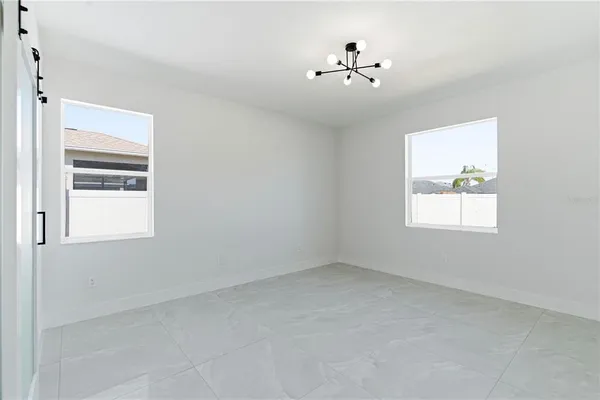 a bathroom with a double vanity sink a mirror and shower