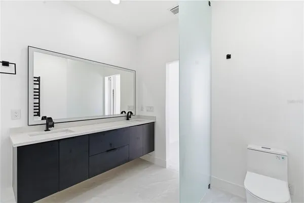 a view of room with a fan