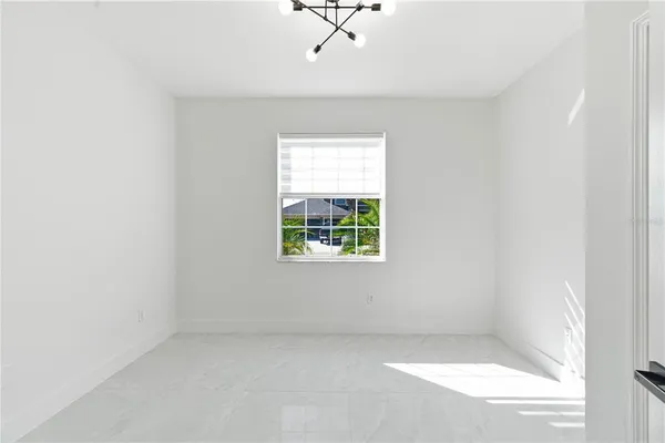 a view of a bedroom with a window