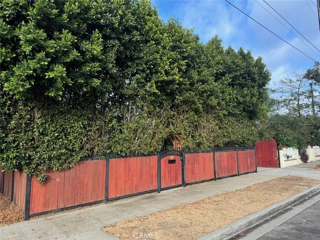a view of a car in front of a house