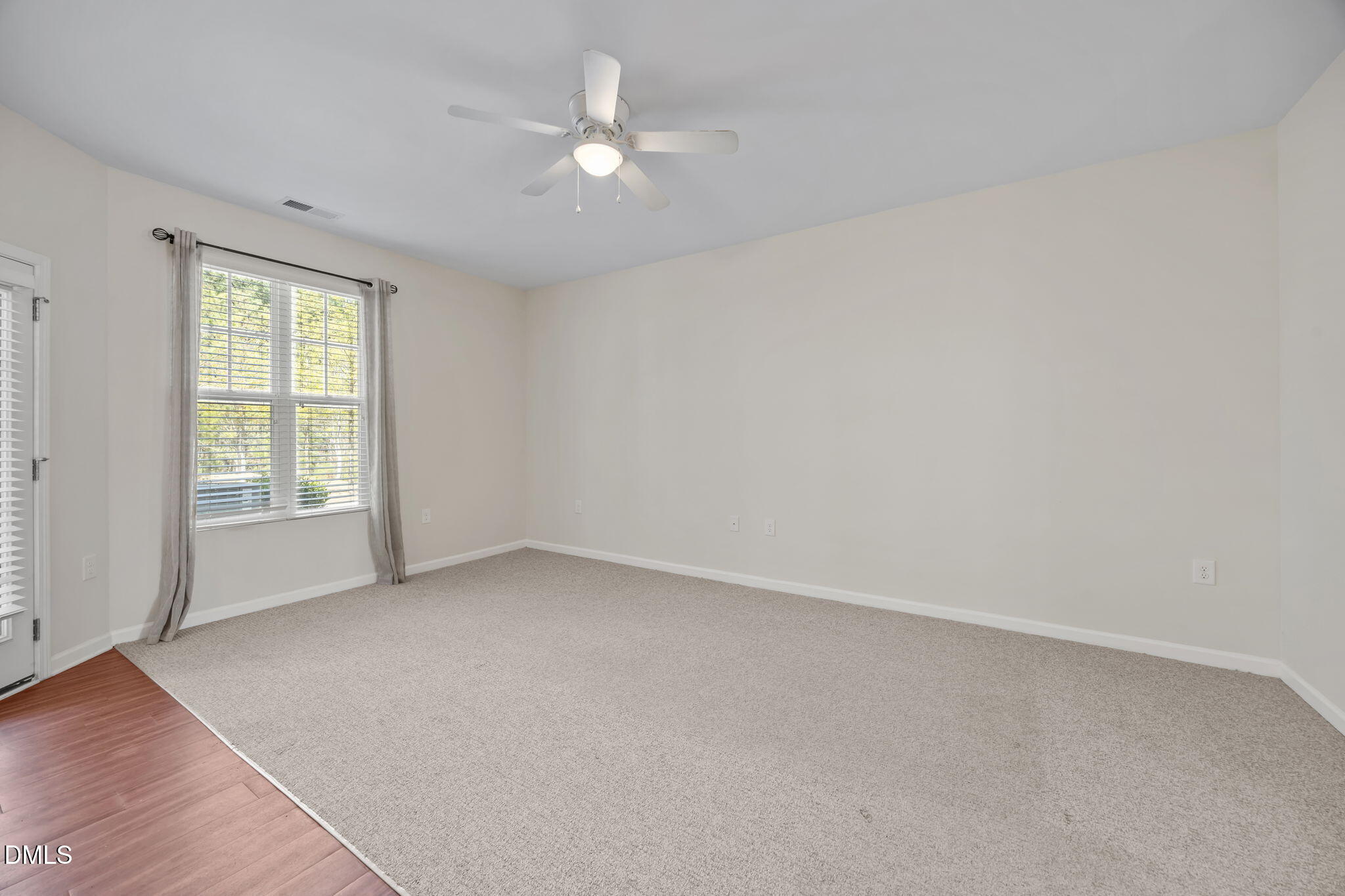 1005 Epiphany Road Morrisville, NC 27560 - Photo 9 of 23 an empty room with a window