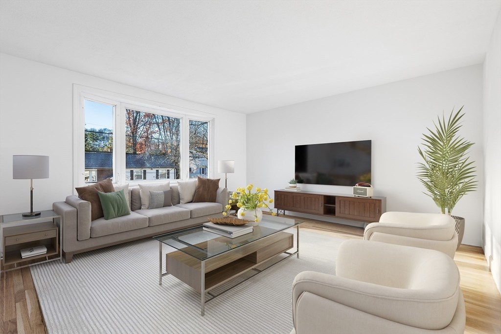 73 Lockwood Road Lynn, MA 01904 - Photo 3 of 10 a living room with furniture and a flat screen tv