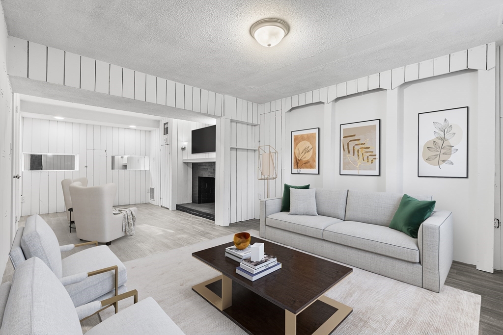 73 Lockwood Road Lynn, MA 01904 - Photo 4 of 10 a living room with furniture and a table