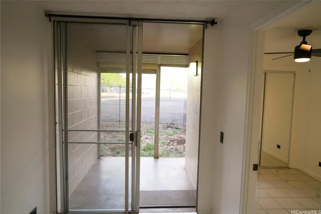 a bathroom with a glass shower door