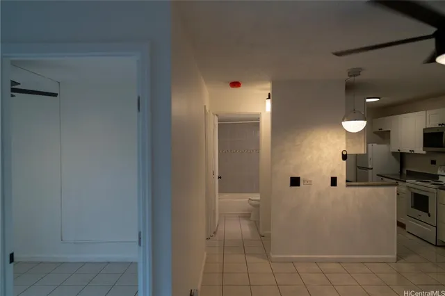 a view of a kitchen with a sink
