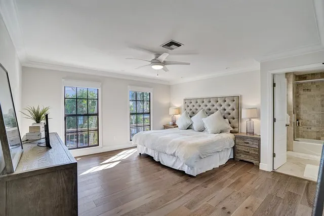a view of a bedroom with washer and dryer