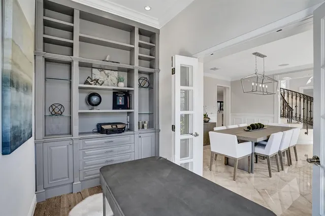 a living room with furniture fireplace and flat screen tv