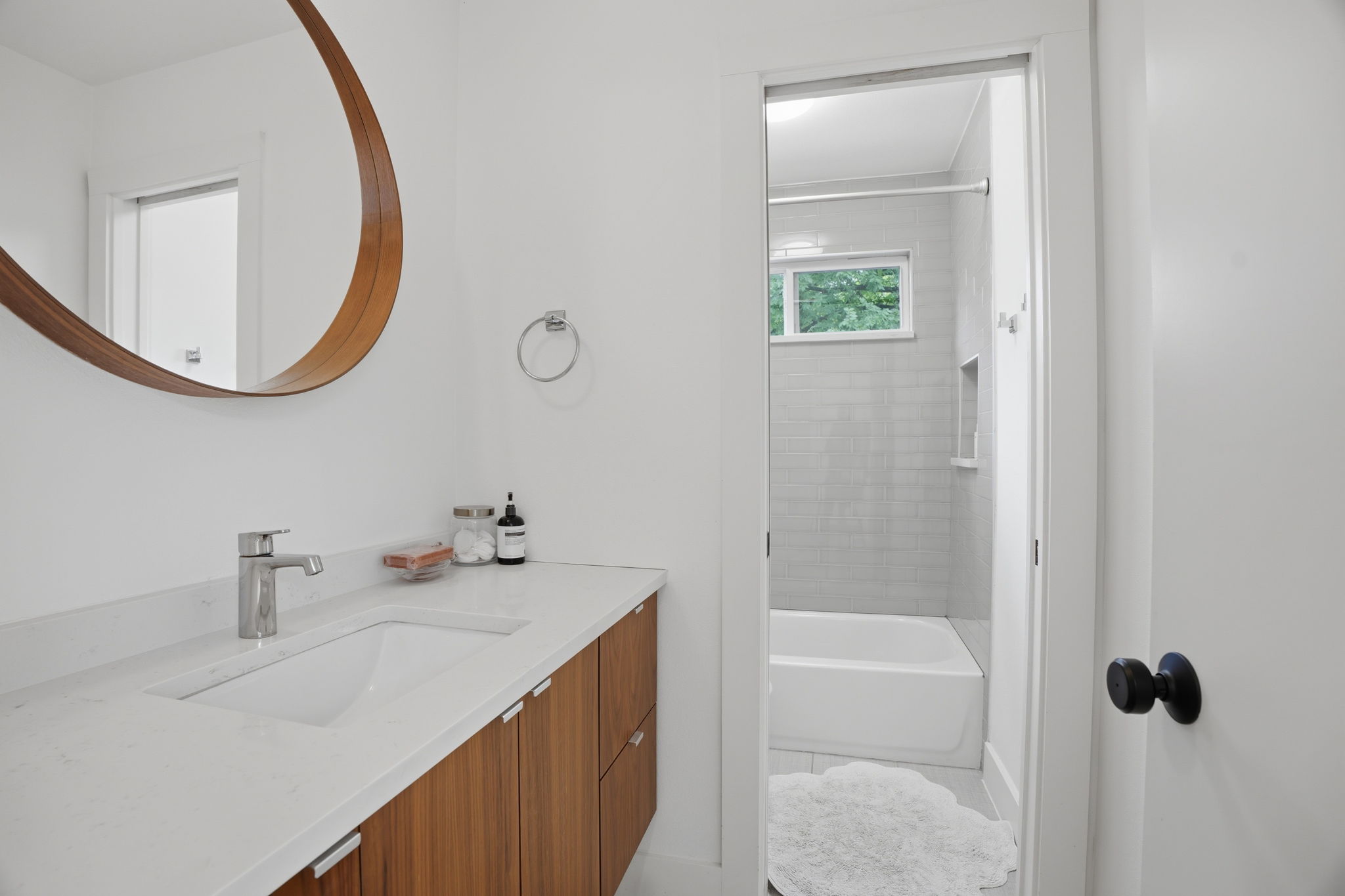 4609 Sara Drive, Unit B Austin, TX 78721 - Photo 21 of 39 Full guest bath boasts a modern, floating vanity