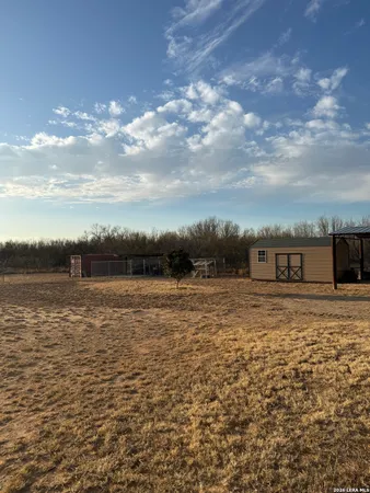 a view of a lake with a big yard