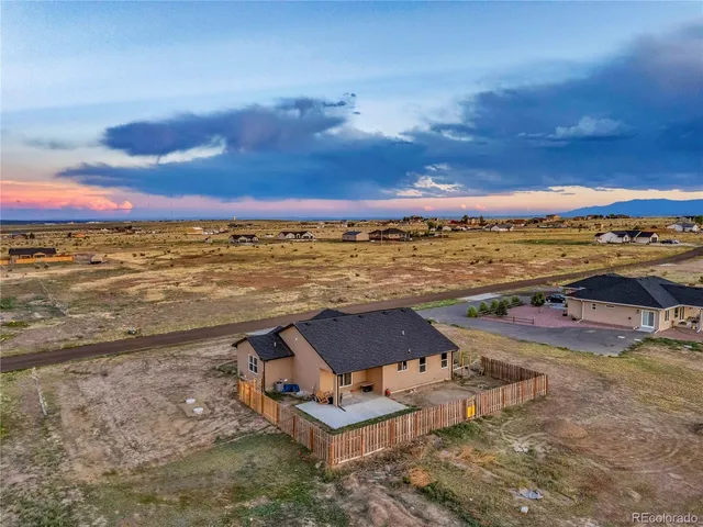 a view of a yard with ocean view