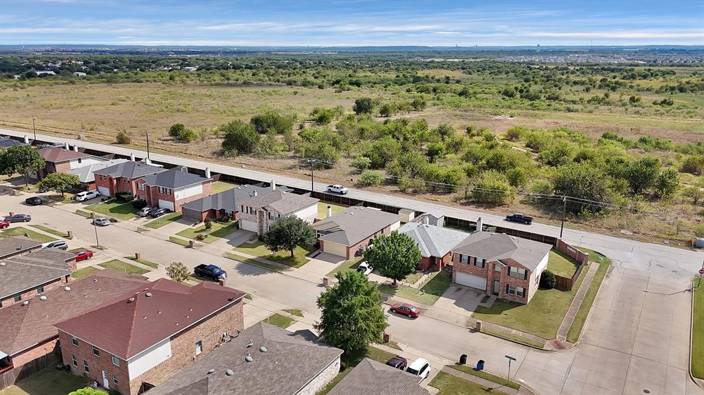 4021 German Pointer Way Fort Worth, TX 76123 - Photo 6 of 38 an aerial view of a house with a lake view