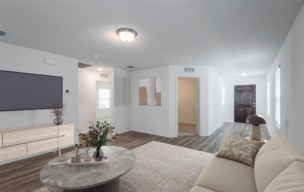 7510 Fenton Parkway Pilot Point, TX 76258 - Photo 4 of 7 Gathering room with view of main living areas *Model Representation*