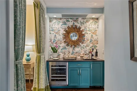 a view of door with wooden floor