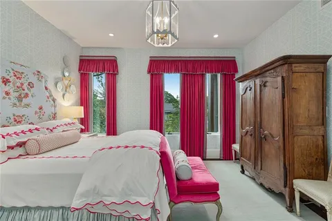 a bedroom with a bed and furniture